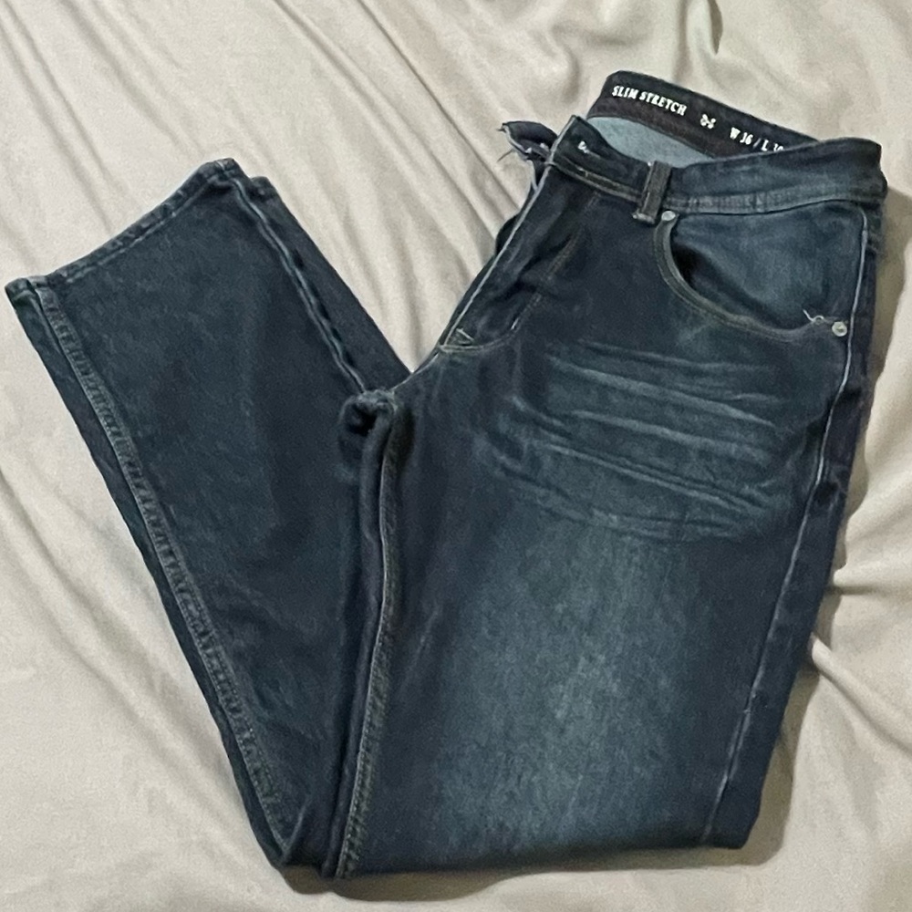 Slim Straight Blue Jeans with Natural Wear Patterns